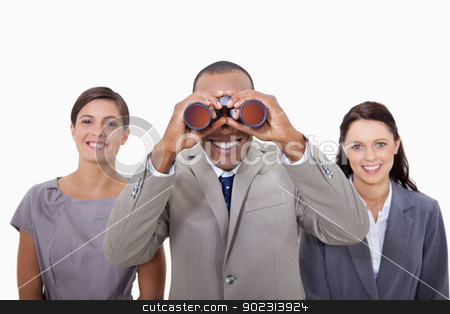 To use this stock image in your creative project, please select the size you need over to the right and click the "Add to Cart" button.
Your downloaded image will come with the Cutcaster watermark removed so don’t worry about the watermark you see on this page. Businessman with colleagues looking through binoculars stock photo, Businessman with colleagues looking through binoculars against a white background by Wavebreak Media