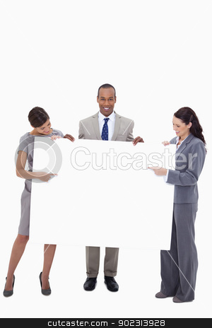 To use this stock image in your creative project, please select the size you need over to the right and click the "Add to Cart" button.
Your downloaded image will come with the Cutcaster watermark removed so don’t worry about the watermark you see on this page. Businesspeople pointing at blank sign in their hands stock photo, Businesspeople pointing at blank sign in their hands against a white background by Wavebreak Media