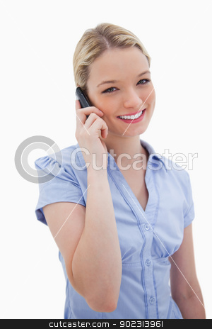 To use this stock image in your creative project, please select the size you need over to the right and click the "Add to Cart" button.
Your downloaded image will come with the Cutcaster watermark removed so don’t worry about the watermark you see on this page. Smiling woman using cellphone stock photo, Smiling woman using cellphone against a white background by Wavebreak Media