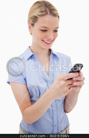 To use this stock image in your creative project, please select the size you need over to the right and click the "Add to Cart" button.
Your downloaded image will come with the Cutcaster watermark removed so don’t worry about the watermark you see on this page. Smiling woman writing text message stock photo, Smiling woman writing text message against a white background by Wavebreak Media