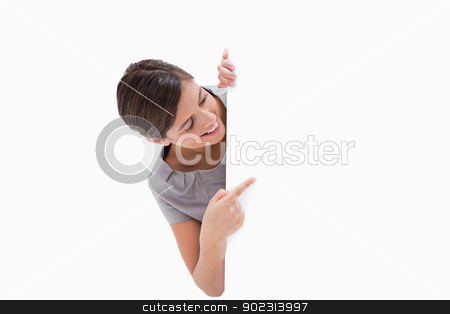 To use this stock image in your creative project, please select the size you need over to the right and click the "Add to Cart" button.
Your downloaded image will come with the Cutcaster watermark removed so don’t worry about the watermark you see on this page. Woman pointing around the corner stock photo, Woman pointing around the corner against a white background by Wavebreak Media