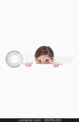 To use this stock image in your creative project, please select the size you need over to the right and click the "Add to Cart" button.
Your downloaded image will come with the Cutcaster watermark removed so don’t worry about the watermark you see on this page. Sneaky woman looking over blank wall stock photo, Sneaky woman looking over blank wall against a white background by Wavebreak Media