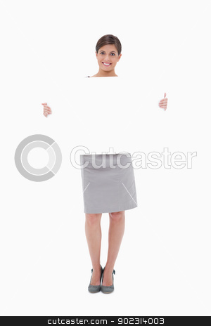 To use this stock image in your creative project, please select the size you need over to the right and click the "Add to Cart" button.
Your downloaded image will come with the Cutcaster watermark removed so don’t worry about the watermark you see on this page. Woman holding blank sign stock photo, Woman holding blank sign against a white background by Wavebreak Media