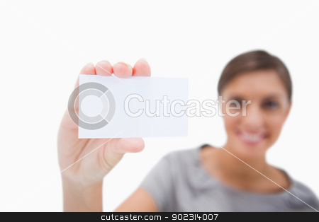To use this stock image in your creative project, please select the size you need over to the right and click the "Add to Cart" button.
Your downloaded image will come with the Cutcaster watermark removed so don’t worry about the watermark you see on this page. Blank business card being presented by woman stock photo, Blank business card being presented by woman against a white background by Wavebreak Media