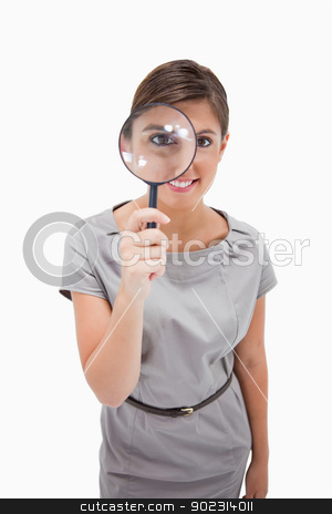 To use this stock image in your creative project, please select the size you need over to the right and click the "Add to Cart" button.
Your downloaded image will come with the Cutcaster watermark removed so don’t worry about the watermark you see on this page. Woman using magnifier stock photo, Woman using magnifier against a white background by Wavebreak Media