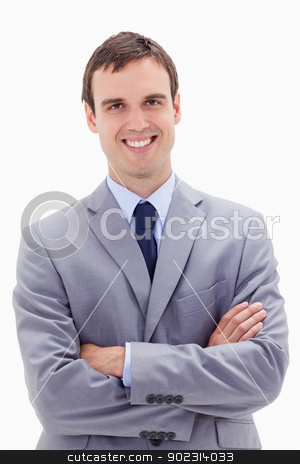 To use this stock image in your creative project, please select the size you need over to the right and click the "Add to Cart" button.
Your downloaded image will come with the Cutcaster watermark removed so don’t worry about the watermark you see on this page. Smiling businessman standing with arms folded stock photo, Smiling businessman standing with arms folded against a white background by Wavebreak Media
