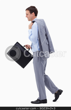 To use this stock image in your creative project, please select the size you need over to the right and click the "Add to Cart" button.
Your downloaded image will come with the Cutcaster watermark removed so don’t worry about the watermark you see on this page. Side view of walking and smiling businessman with suitcase stock photo, Side view of walking and smiling businessman with suitcase against a white background by Wavebreak Media