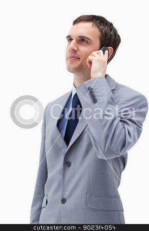 To use this stock image in your creative project, please select the size you need over to the right and click the "Add to Cart" button.
Your downloaded image will come with the Cutcaster watermark removed so don’t worry about the watermark you see on this page. Businessman looking up while on the phone stock photo, Businessman looking up while on the phone against a white background by Wavebreak Media
