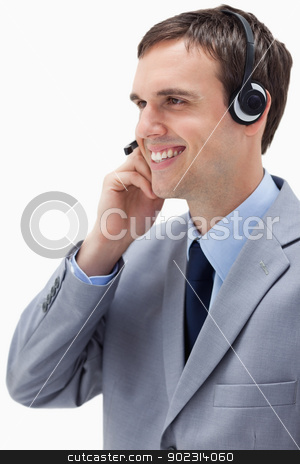 To use this stock image in your creative project, please select the size you need over to the right and click the "Add to Cart" button.
Your downloaded image will come with the Cutcaster watermark removed so don’t worry about the watermark you see on this page. Side view of businessman using headset stock photo, Side view of businessman using headset against a white background by Wavebreak Media