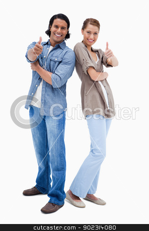 To use this stock image in your creative project, please select the size you need over to the right and click the "Add to Cart" button.
Your downloaded image will come with the Cutcaster watermark removed so don’t worry about the watermark you see on this page. Smiling couple giving thumbs up stock photo, Smiling couple giving thumbs up against a white background by Wavebreak Media