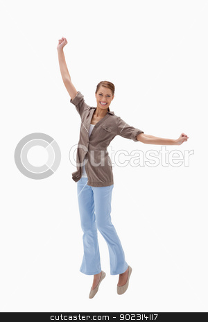 To use this stock image in your creative project, please select the size you need over to the right and click the "Add to Cart" button.
Your downloaded image will come with the Cutcaster watermark removed so don’t worry about the watermark you see on this page. Happy woman jumping stock photo, Happy woman jumping against a white background by Wavebreak Media