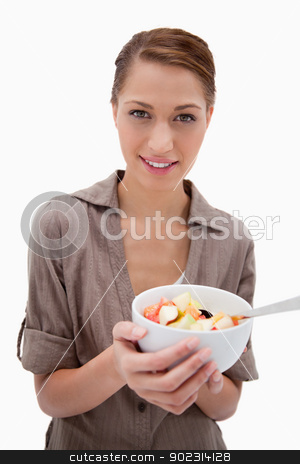 To use this stock image in your creative project, please select the size you need over to the right and click the "Add to Cart" button.
Your downloaded image will come with the Cutcaster watermark removed so don’t worry about the watermark you see on this page. Woman with bowl of fruit salad stock photo, Woman with bowl of fruit salad against a white background by Wavebreak Media
