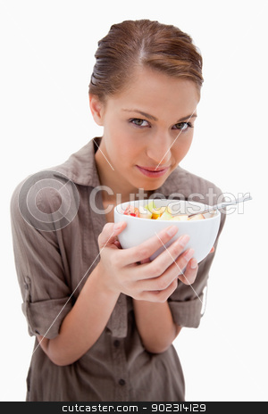 To use this stock image in your creative project, please select the size you need over to the right and click the "Add to Cart" button.
Your downloaded image will come with the Cutcaster watermark removed so don’t worry about the watermark you see on this page. Woman with a bowl of fruit salad stock photo, Woman with a bowl of fruit salad against a white background by Wavebreak Media