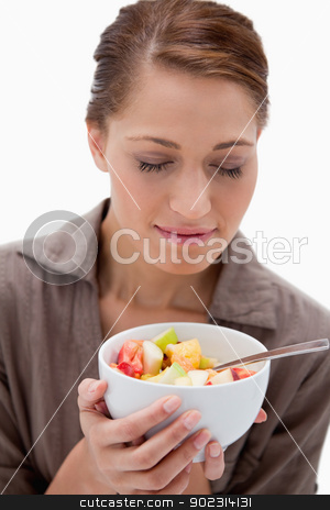 To use this stock image in your creative project, please select the size you need over to the right and click the "Add to Cart" button.
Your downloaded image will come with the Cutcaster watermark removed so don’t worry about the watermark you see on this page. Woman smelling on bowl of fruit salad stock photo, Woman smelling on bowl of fruit salad against a white background by Wavebreak Media