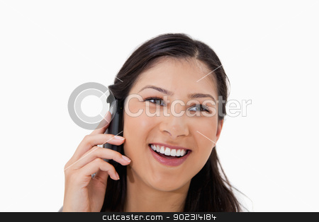 To use this stock image in your creative project, please select the size you need over to the right and click the "Add to Cart" button.
Your downloaded image will come with the Cutcaster watermark removed so don’t worry about the watermark you see on this page. Laughing woman on the cellphone stock photo, Laughing woman on the cellphone against a white background by Wavebreak Media