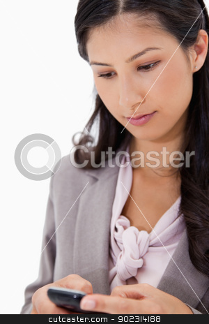 To use this stock image in your creative project, please select the size you need over to the right and click the "Add to Cart" button.
Your downloaded image will come with the Cutcaster watermark removed so don’t worry about the watermark you see on this page. Woman typing text message stock photo, Woman typing text message against a white background by Wavebreak Media