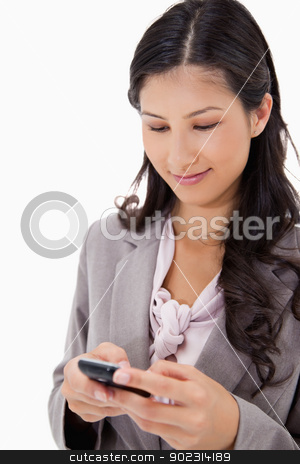 To use this stock image in your creative project, please select the size you need over to the right and click the "Add to Cart" button.
Your downloaded image will come with the Cutcaster watermark removed so don’t worry about the watermark you see on this page. Woman reading text message stock photo, Woman reading text message against a white background by Wavebreak Media