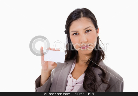 To use this stock image in your creative project, please select the size you need over to the right and click the "Add to Cart" button.
Your downloaded image will come with the Cutcaster watermark removed so don’t worry about the watermark you see on this page. Businesswoman with her blank business card stock photo, Businesswoman with her blank business card against a white background by Wavebreak Media