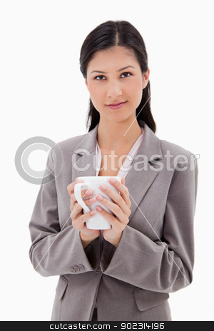 To use this stock image in your creative project, please select the size you need over to the right and click the "Add to Cart" button.
Your downloaded image will come with the Cutcaster watermark removed so don’t worry about the watermark you see on this page. Businesswoman holding cup stock photo, Businesswoman holding cup against a white background by Wavebreak Media