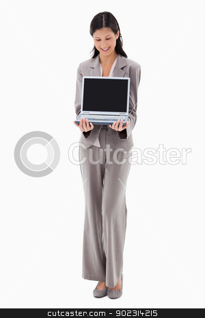 To use this stock image in your creative project, please select the size you need over to the right and click the "Add to Cart" button.
Your downloaded image will come with the Cutcaster watermark removed so don’t worry about the watermark you see on this page. Businesswoman presenting notebook stock photo, Businesswoman presenting notebook against a white background by Wavebreak Media