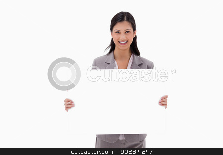 To use this stock image in your creative project, please select the size you need over to the right and click the "Add to Cart" button.
Your downloaded image will come with the Cutcaster watermark removed so don’t worry about the watermark you see on this page. Smiling businesswoman with blank sign board stock photo, Smiling businesswoman with blank sign board against a white background by Wavebreak Media