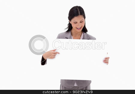 To use this stock image in your creative project, please select the size you need over to the right and click the "Add to Cart" button.
Your downloaded image will come with the Cutcaster watermark removed so don’t worry about the watermark you see on this page. Businesswoman looking and pointing at blank sign board stock photo, Businesswoman looking and pointing at blank sign board against a white background by Wavebreak Media