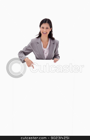 To use this stock image in your creative project, please select the size you need over to the right and click the "Add to Cart" button.
Your downloaded image will come with the Cutcaster watermark removed so don’t worry about the watermark you see on this page. Smiling businesswoman pointing at blank sign stock photo, Smiling businesswoman pointing at blank sign against a white background by Wavebreak Media