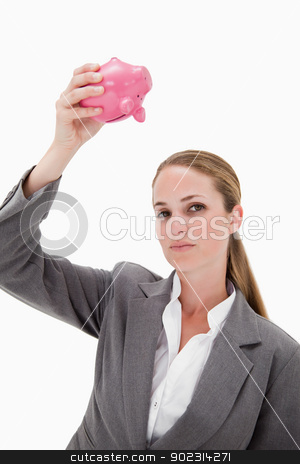 To use this stock image in your creative project, please select the size you need over to the right and click the "Add to Cart" button.
Your downloaded image will come with the Cutcaster watermark removed so don’t worry about the watermark you see on this page. Bank employee holding piggy bank over her head stock photo, Bank employee holding piggy bank over her head against a white background by Wavebreak Media