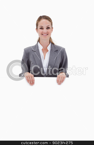 To use this stock image in your creative project, please select the size you need over to the right and click the "Add to Cart" button.
Your downloaded image will come with the Cutcaster watermark removed so don’t worry about the watermark you see on this page. Smiling bank employee holding blank sign in her hands stock photo, Smiling bank employee holding blank sign in her hands against a white background by Wavebreak Media