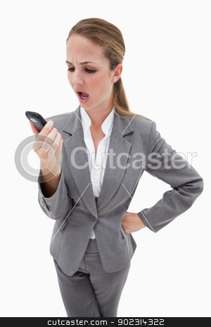 To use this stock image in your creative project, please select the size you need over to the right and click the "Add to Cart" button.
Your downloaded image will come with the Cutcaster watermark removed so don’t worry about the watermark you see on this page. Indignant looking bank employee reading text message stock photo, Indignant looking bank employee reading text message against a white background by Wavebreak Media