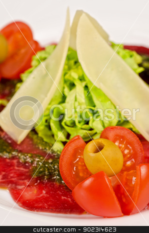 To use this stock image in your creative project, please select the size you need over to the right and click the "Add to Cart" button.
Your downloaded image will come with the Cutcaster watermark removed so don’t worry about the watermark you see on this page. Meat carpaccio stock photo, Meat carpaccio from beef meat, parmesan cheese, olive, tomato, sauce pesto by olinchuk