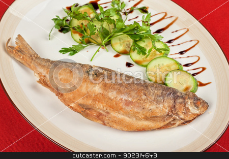 To use this stock image in your creative project, please select the size you need over to the right and click the "Add to Cart" button.
Your downloaded image will come with the Cutcaster watermark removed so don’t worry about the watermark you see on this page. Fried peled fish stock photo, Fried peled fish with cucumbers and greens by olinchuk