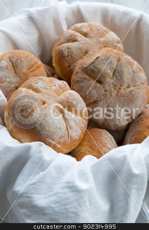 To use this stock image in your creative project, please select the size you need over to the right and click the "Add to Cart" button.
Your downloaded image will come with the Cutcaster watermark removed so don’t worry about the watermark you see on this page. Rustic bread stock photo, Baked bread by Giordano Aita