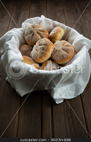 To use this stock image in your creative project, please select the size you need over to the right and click the "Add to Cart" button.
Your downloaded image will come with the Cutcaster watermark removed so don’t worry about the watermark you see on this page. Rustic bread stock photo, Baked bread by Giordano Aita