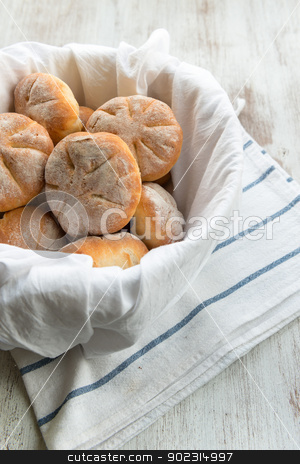 To use this stock image in your creative project, please select the size you need over to the right and click the "Add to Cart" button.
Your downloaded image will come with the Cutcaster watermark removed so don’t worry about the watermark you see on this page. Rustic bread stock photo, Baked bread by Giordano Aita