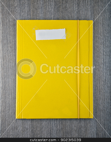 To use this stock image in your creative project, please select the size you need over to the right and click the "Add to Cart" button.
Your downloaded image will come with the Cutcaster watermark removed so don’t worry about the watermark you see on this page. Yellow folder stock photo, A yellow folder with empty white paper label by Fabio Alcini