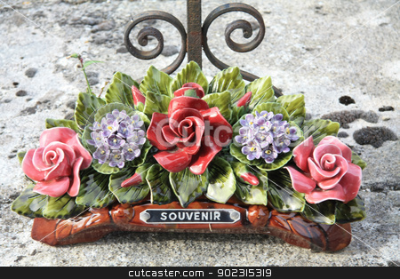 To use this stock image in your creative project, please select the size you need over to the right and click the "Add to Cart" button.
Your downloaded image will come with the Cutcaster watermark removed so don’t worry about the watermark you see on this page. Ceramic sympathy flowers stock photo, Ceramic sympathy flowers at a French graveyard by Porto Sabbia