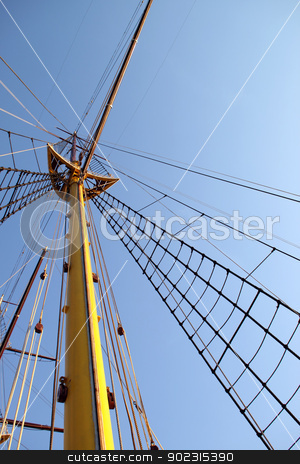 To use this stock image in your creative project, please select the size you need over to the right and click the "Add to Cart" button.
Your downloaded image will come with the Cutcaster watermark removed so don’t worry about the watermark you see on this page. Mast stock photo, Yellow wooden mast of old sailing boat by vaximilian