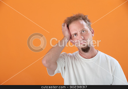 To use this stock image in your creative project, please select the size you need over to the right and click the "Add to Cart" button.
Your downloaded image will come with the Cutcaster watermark removed so don’t worry about the watermark you see on this page. Man With Hand on Head stock photo, Caucasian man with goatee and hand on his head by Scott Griessel