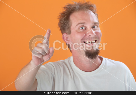 To use this stock image in your creative project, please select the size you need over to the right and click the "Add to Cart" button.
Your downloaded image will come with the Cutcaster watermark removed so don’t worry about the watermark you see on this page. Man Points Up stock photo, Happy Caucasian man points index finger upward by Scott Griessel