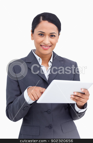 To use this stock image in your creative project, please select the size you need over to the right and click the "Add to Cart" button.
Your downloaded image will come with the Cutcaster watermark removed so don’t worry about the watermark you see on this page. Close up of saleswoman using touch screen computer stock photo, Close up of saleswoman using touch screen computer against a white background by Wavebreak Media