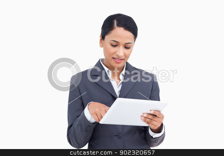To use this stock image in your creative project, please select the size you need over to the right and click the "Add to Cart" button.
Your downloaded image will come with the Cutcaster watermark removed so don’t worry about the watermark you see on this page. Close up of saleswoman with her touch screen computer stock photo, Close up of saleswoman with her touch screen computer against a white background by Wavebreak Media