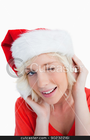 To use this stock image in your creative project, please select the size you need over to the right and click the "Add to Cart" button.
Your downloaded image will come with the Cutcaster watermark removed so don’t worry about the watermark you see on this page. Young woman wearing Christmas clothes while blinking an eye stock photo, Young blonde woman winking an eye while wearing Christmas clothes by Wavebreak Media