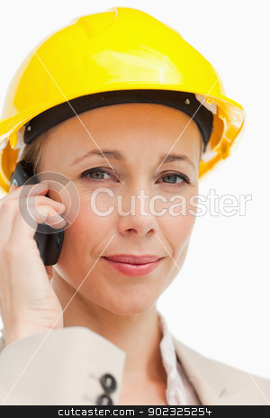 To use this stock image in your creative project, please select the size you need over to the right and click the "Add to Cart" button.
Your downloaded image will come with the Cutcaster watermark removed so don’t worry about the watermark you see on this page. Portrait of a businesswoman on the phone wearing safety helmet stock photo, Portrait of a businesswoman on the phone wearing safety helmet against white background by Wavebreak Media