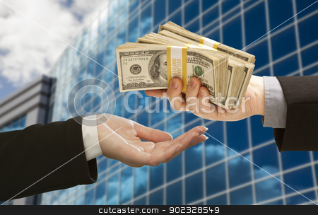 To use this stock image in your creative project, please select the size you need over to the right and click the "Add to Cart" button.
Your downloaded image will come with the Cutcaster watermark removed so don’t worry about the watermark you see on this page. Male Handing Stack of Cash to Woman with Corporate Building stock photo, Male Hand Handing Stack of Cash to Woman with Corporate Building. by Andy Dean