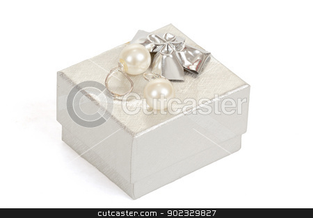 To use this stock image in your creative project, please select the size you need over to the right and click the "Add to Cart" button.
Your downloaded image will come with the Cutcaster watermark removed so don’t worry about the watermark you see on this page. two pearl earrings and gift box isolated on white stock photo, two pearl earrings and gift box isolated on white background by Artush