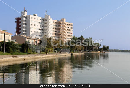 To use this stock image in your creative project, please select the size you need over to the right and click the "Add to Cart" button.
Your downloaded image will come with the Cutcaster watermark removed so don’t worry about the watermark you see on this page. Spanish tourist hotel stock photo, Scenic view of Spanish tourist hotel by side of lake on island of Majorca, Spain. by Martin Crowdy