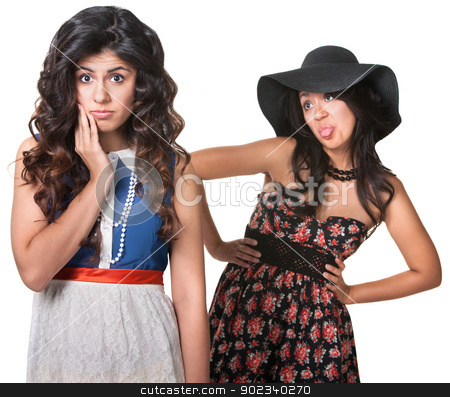 To use this stock image in your creative project, please select the size you need over to the right and click the "Add to Cart" button.
Your downloaded image will come with the Cutcaster watermark removed so don’t worry about the watermark you see on this page. Woman Sticking Tongue Out at Friend stock photo, Young woman sticking her tongue out behind friend by Scott Griessel