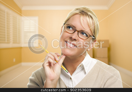 To use this stock image in your creative project, please select the size you need over to the right and click the "Add to Cart" button.
Your downloaded image will come with the Cutcaster watermark removed so don’t worry about the watermark you see on this page. Daydreaming Woman with Pencil in Empty Room and Boxes stock photo, Attractive Daydreaming Woman Holding Pencil in Empty Room and Boxes. by Andy Dean