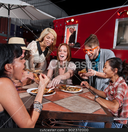 To use this stock image in your creative project, please select the size you need over to the right and click the "Add to Cart" button.
Your downloaded image will come with the Cutcaster watermark removed so don’t worry about the watermark you see on this page. Laughing Group Eat at Canteen stock photo, Group of laughing people eating pizza at a food truck by Scott Griessel